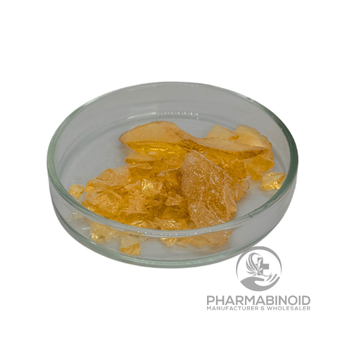 Pharmabinoid PPC isolate powder in a clear container, showing a white, crystalline substance on a white background.